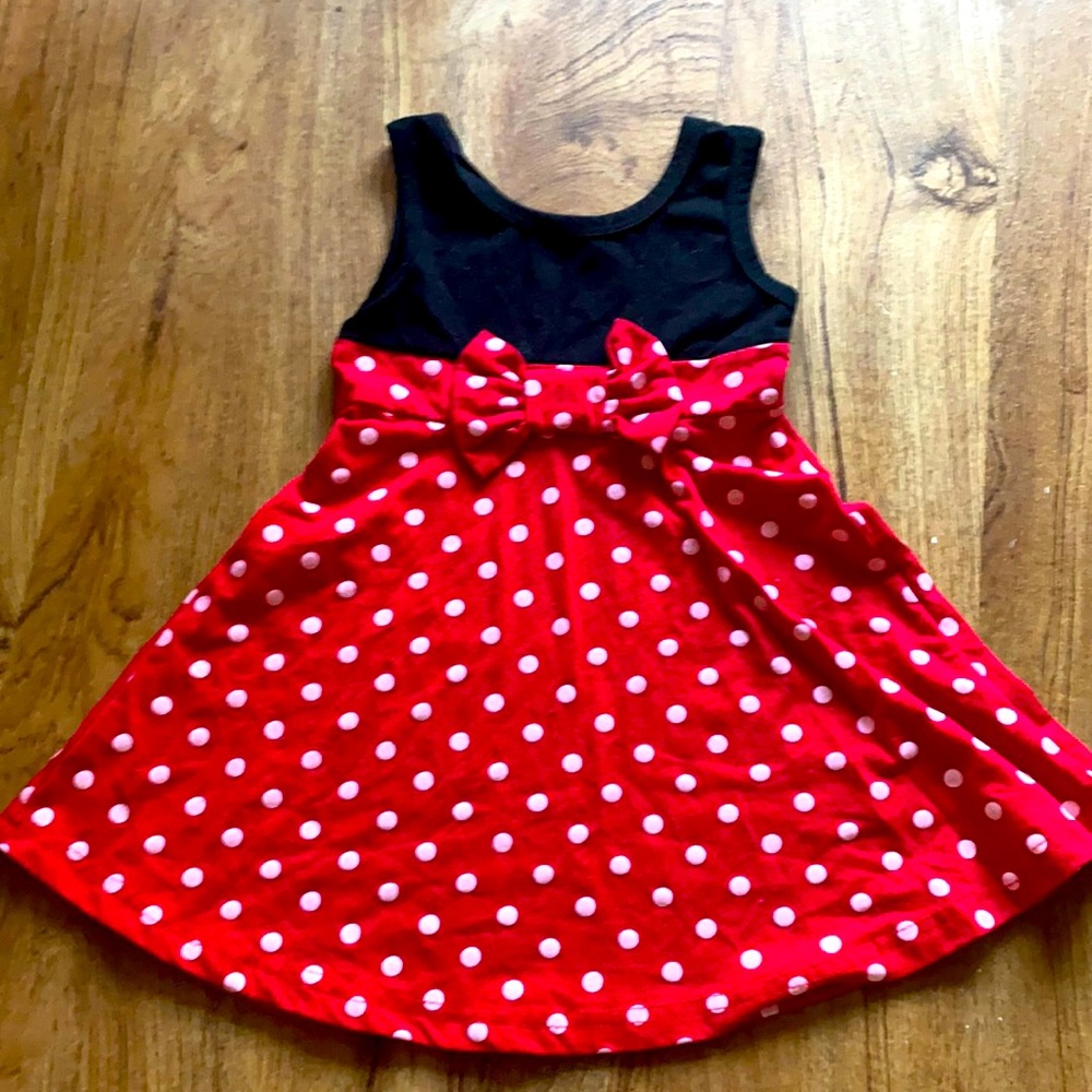 Red and White Polka Dot with Black Chest and Shoulder. Size 18months.